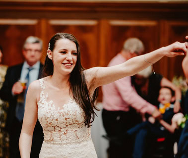 Bride being spat around during dancing