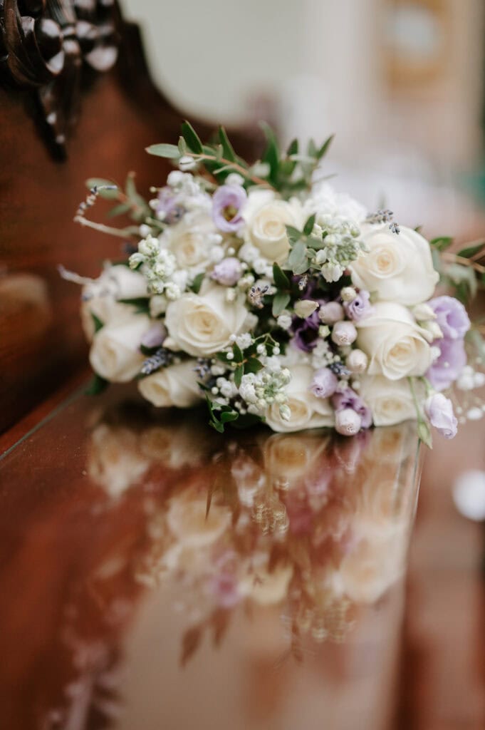 Bridal bouquet with white roses and greenery
