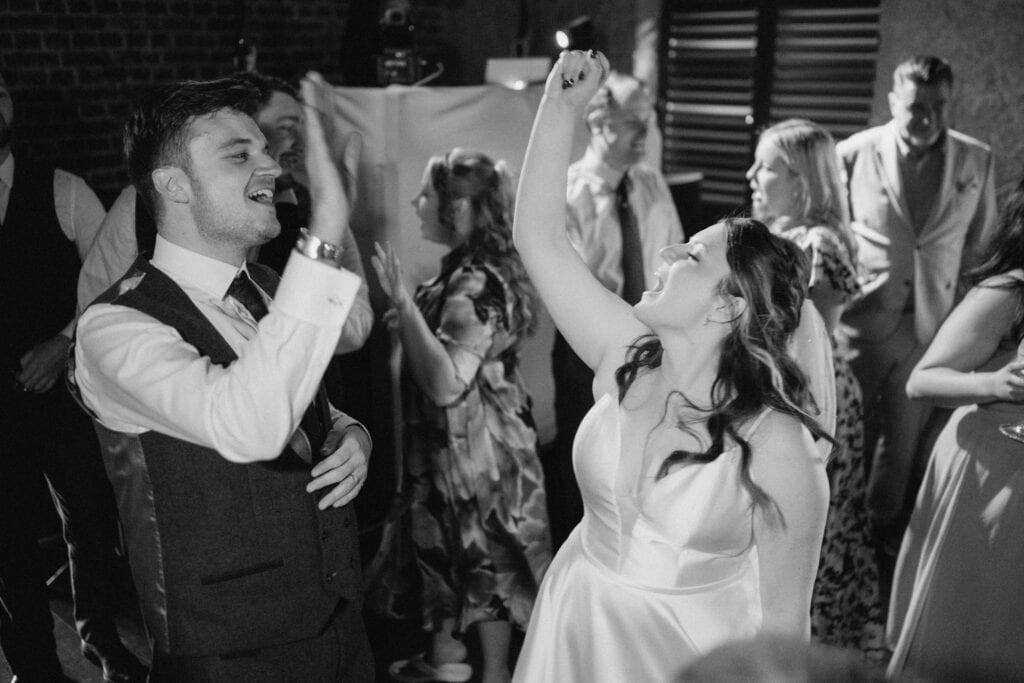 Bride and groom dancing at their wedding reception.