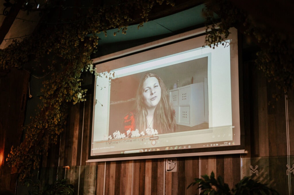 Woman on screen giving a video presentation.