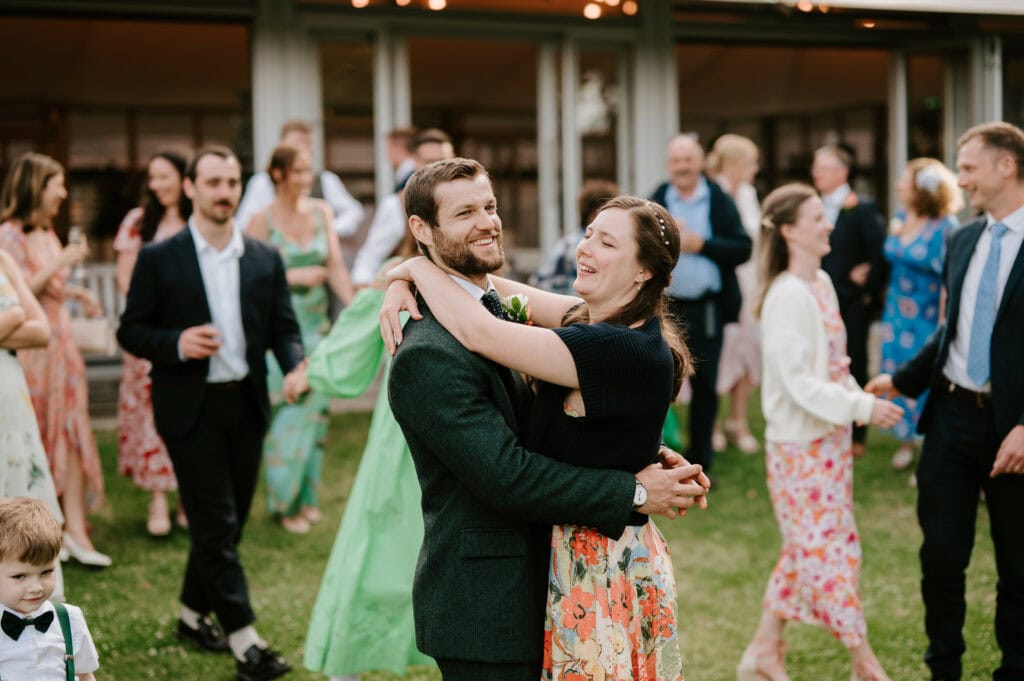Couple dancing at outdoor wedding reception