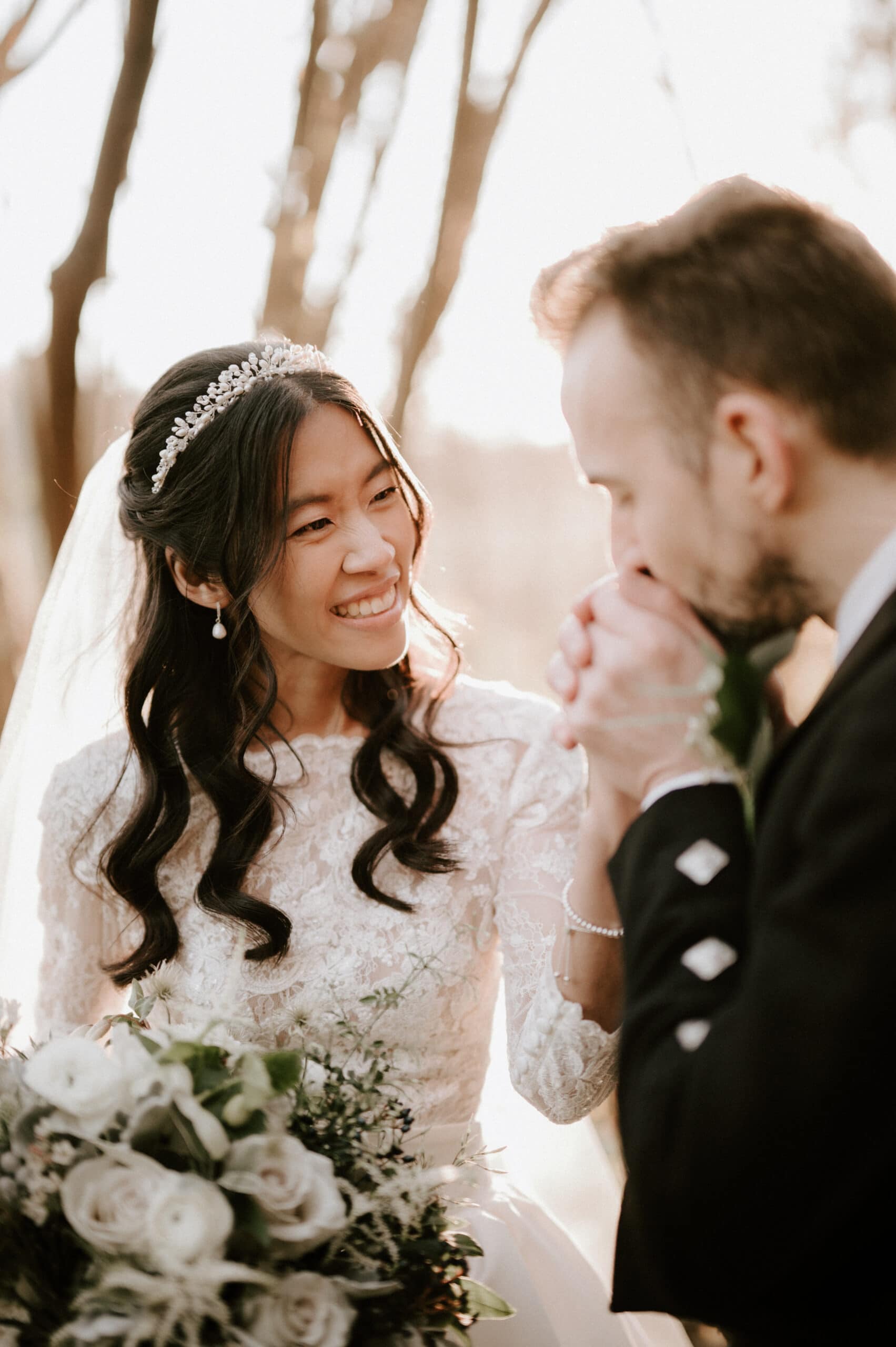 Bride and groom having a tender moment.