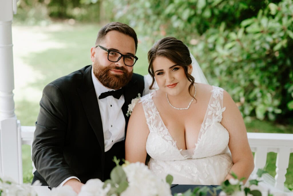Bride and groom smiling on wedding day