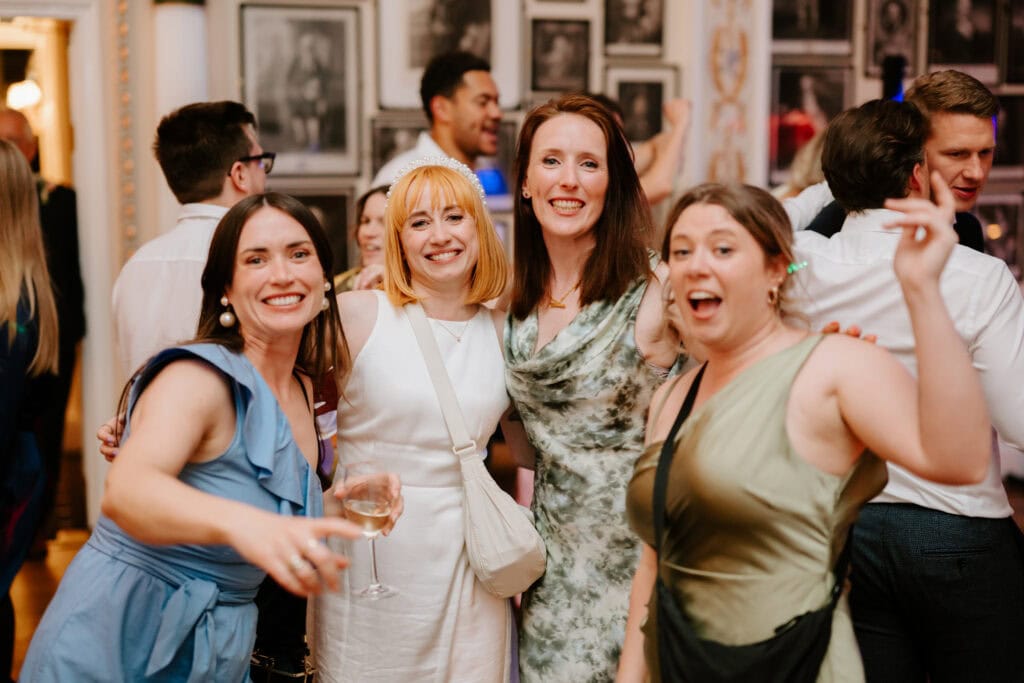 Group of people smiling at a party