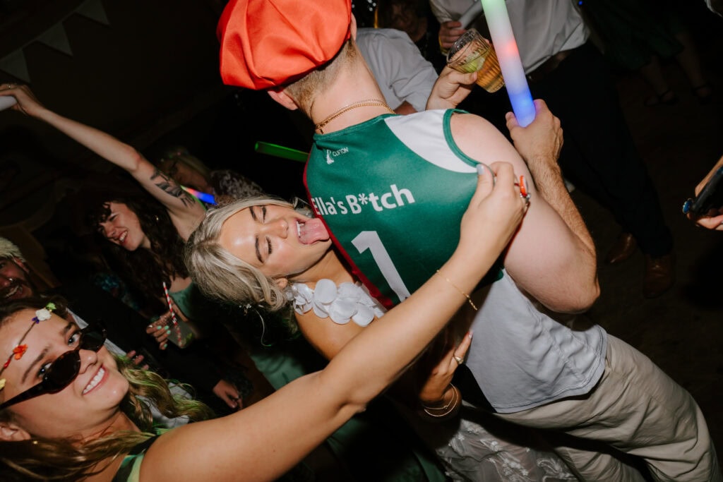 Fun party with costumes and neon lights.