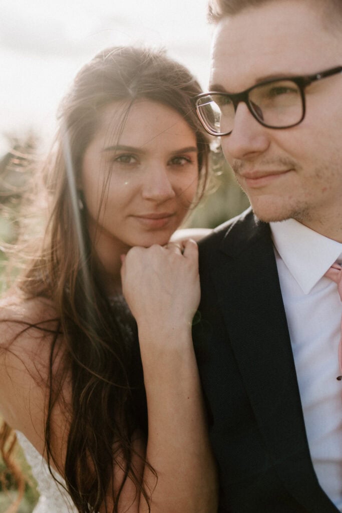 Couple in wedding attire with soft lighting outside albion house in ramsgate